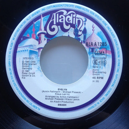 Smash (46) : (Woman) Watcha Gonna Do (7", Single)