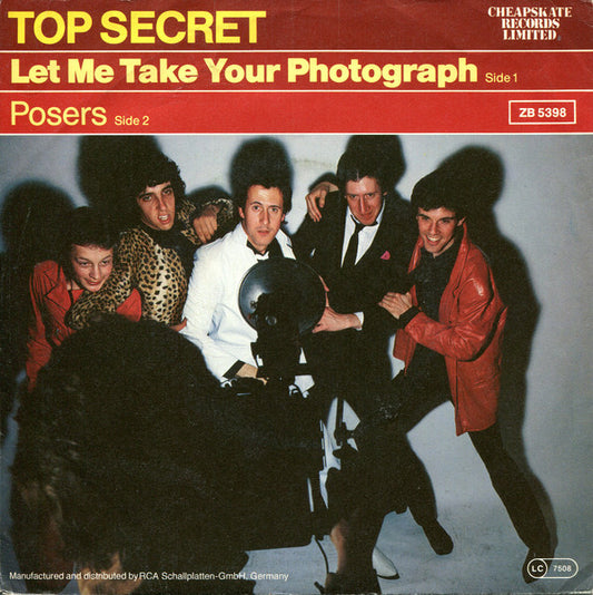 Top Secret (15) : Let Me Take Your Photograph (7", Single)