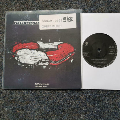 Cornelius* + Cretu* : Rettungsringe Sterben Aus (7", Single)