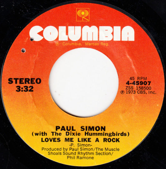 Paul Simon With The Dixie Hummingbirds : Loves Me Like A Rock (7", Single, Styrene, Pit)