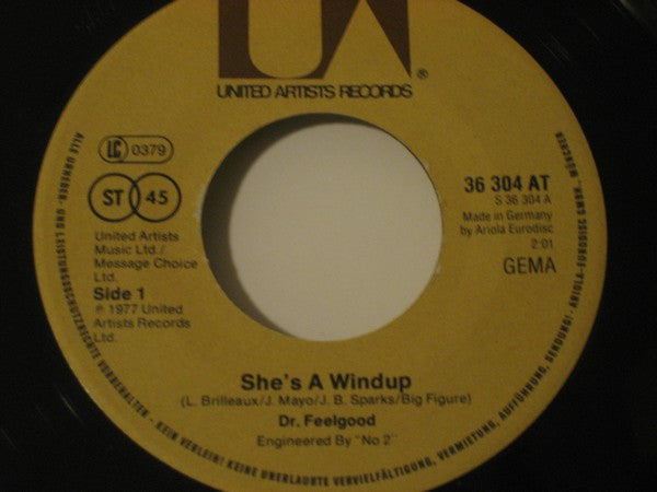 Dr. Feelgood : She's A Windup (7", Single)