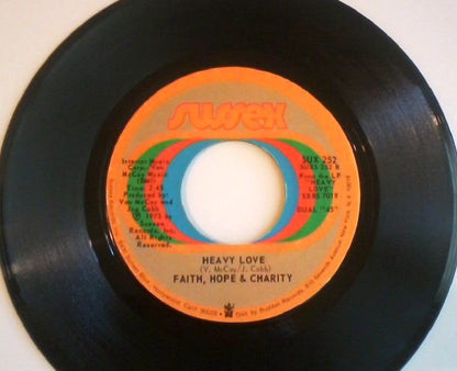 Faith, Hope & Charity : Who Made You Go / Heavy Love (7")