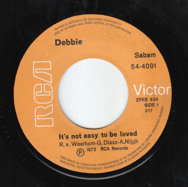 Debbie (6) : It's Not Easy To Be Loved (7", Single)