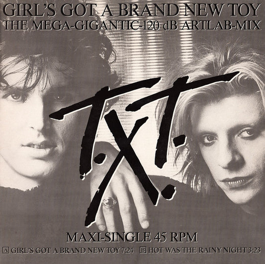 T.X.T. : Girl's Got A Brand New Toy (The Mega-Gigantic-120 dB Artlab-Mix) (12", Maxi)